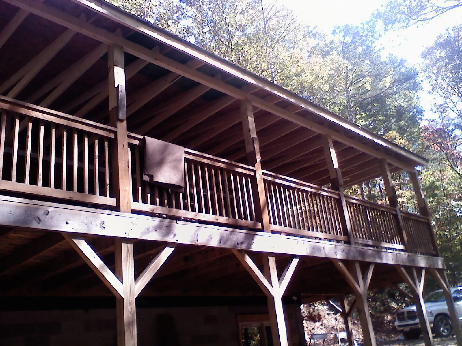 Timber framing under a new elevated porch and deck — Roof Leak Repair in Mountain Top by Roofing Brothers